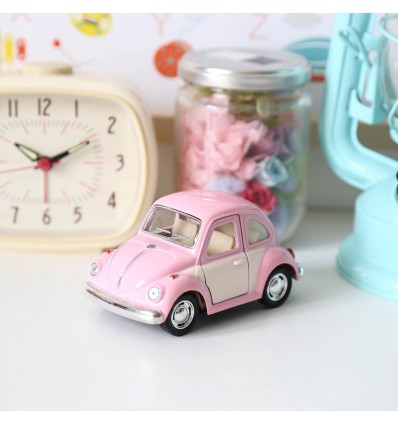 Voiture coccinelle Volskwagen rose pastel