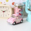 Voiture coccinelle Volskwagen rose pastel